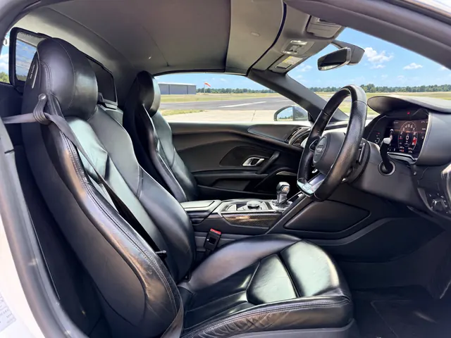 Black leather sports seats inside the Audi R8 Spyder